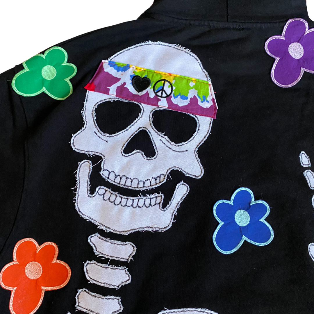 Unapologetic Youth Hippie Dreams hoodie featuring colorful bohemian-inspired design and comfortable fabric.