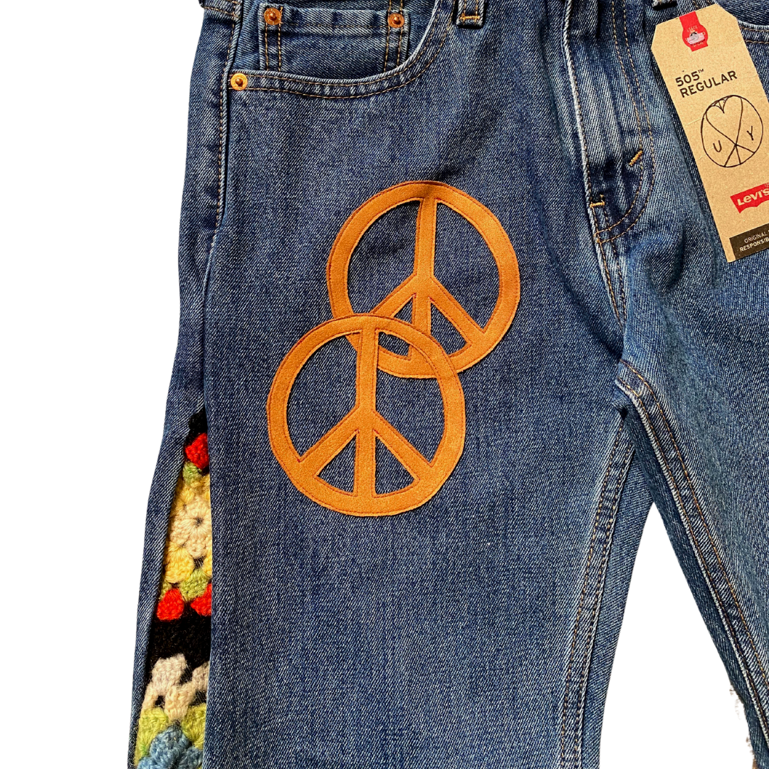 Unapologetic Youth Groovy 30x30 jeans with a classic fit, displaying denim fabric, stitching details, and a mid-rise waist.