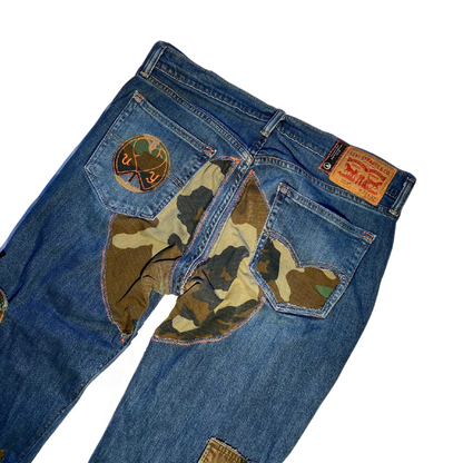 Unapologetic Youth blue denim jeans with classic five-pocket design and straight-leg fit, displayed on a white background.