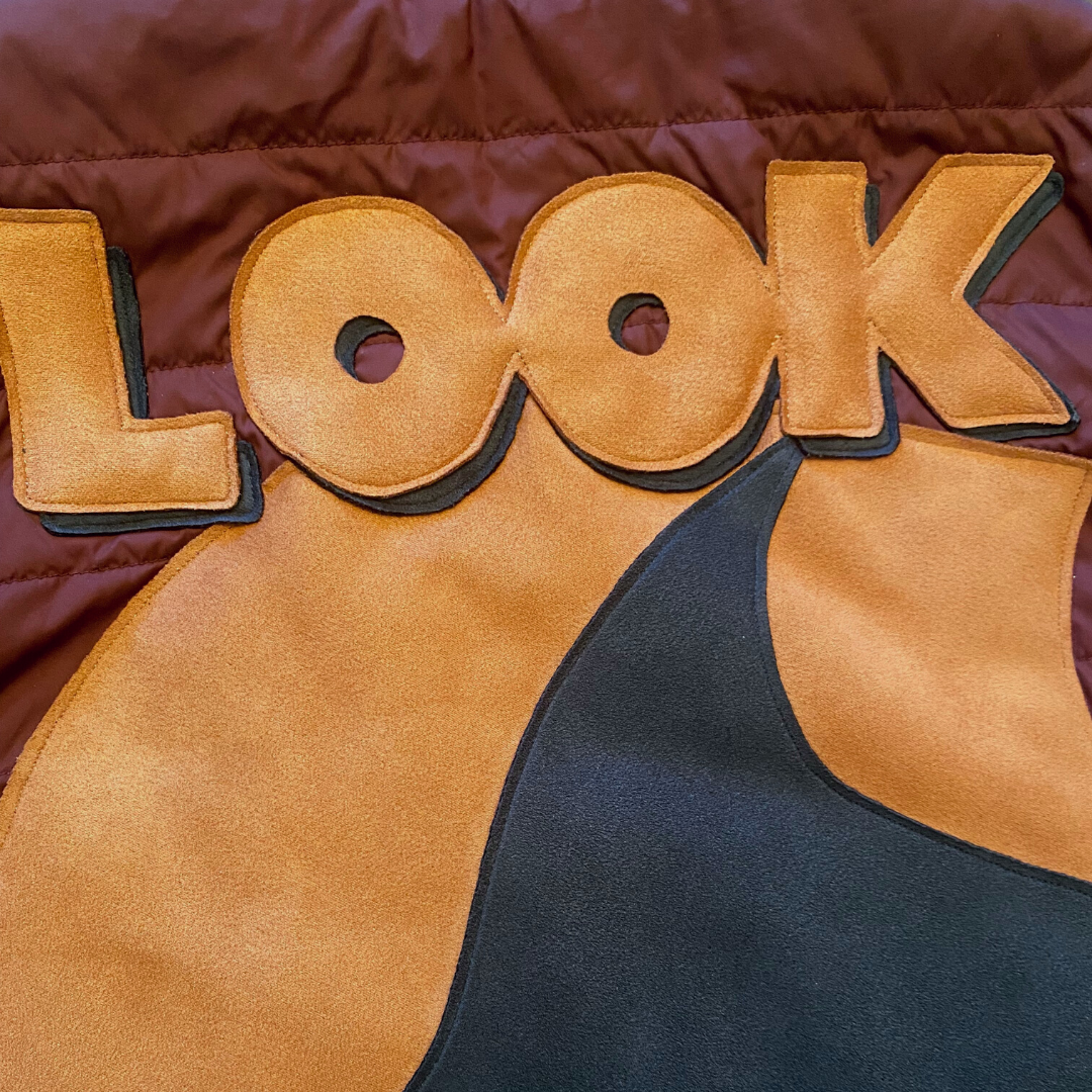 Unapologetic Youth vest featuring bold face graphics, casual fit, and vibrant colors on soft fabric.