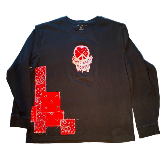 Unapologetic Youth long sleeve shirt with a comfortable fit, featuring a stylish design on the front.