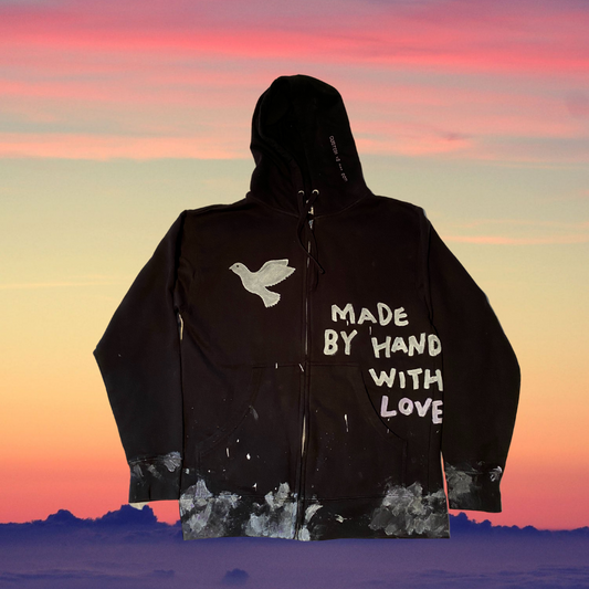 Unapologetic Youth hoodie in black with front logo design, casual fit, and soft fabric, shown on a model.