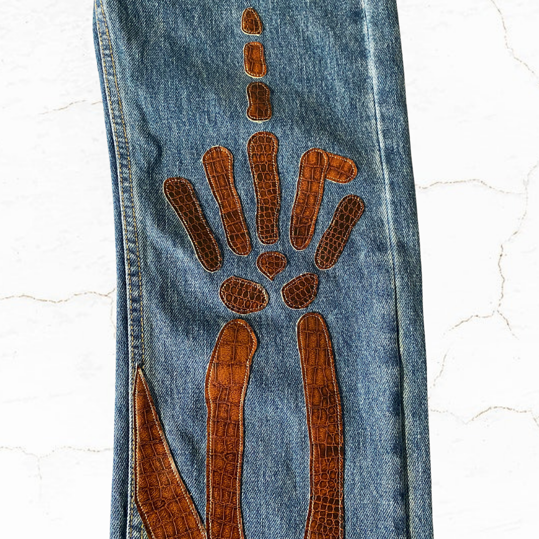 Unapologetic Youth "To The Bone" jeans in a 1/1 size, featuring distressed denim and classic five-pocket design.