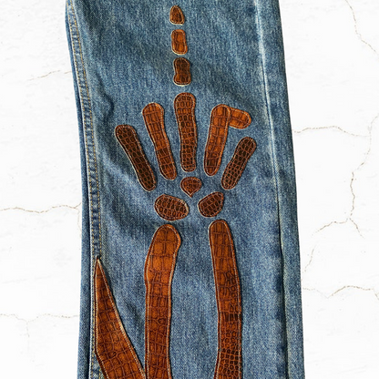 Unapologetic Youth "To The Bone" jeans in a 1/1 size, featuring distressed denim and classic five-pocket design.