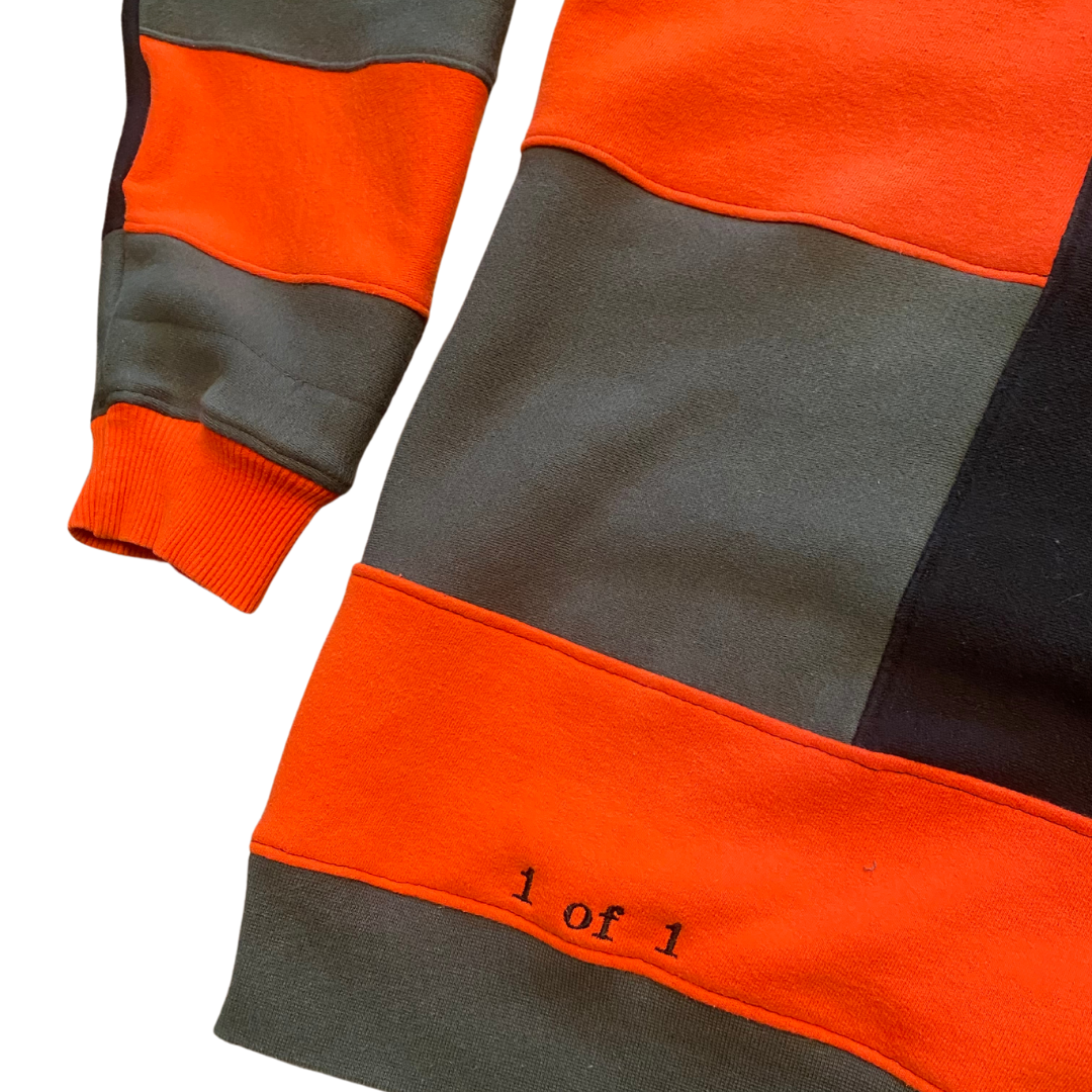 Unapologetic Youth Spooky V2 crewneck sweatshirt with spooky graphic design on a dark fabric background.
