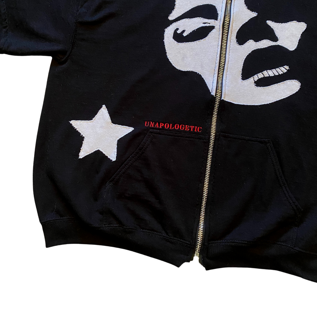 Unapologetic Youth Faces sweatshirt featuring two colorful face designs on a casual, stylish sweatshirt.