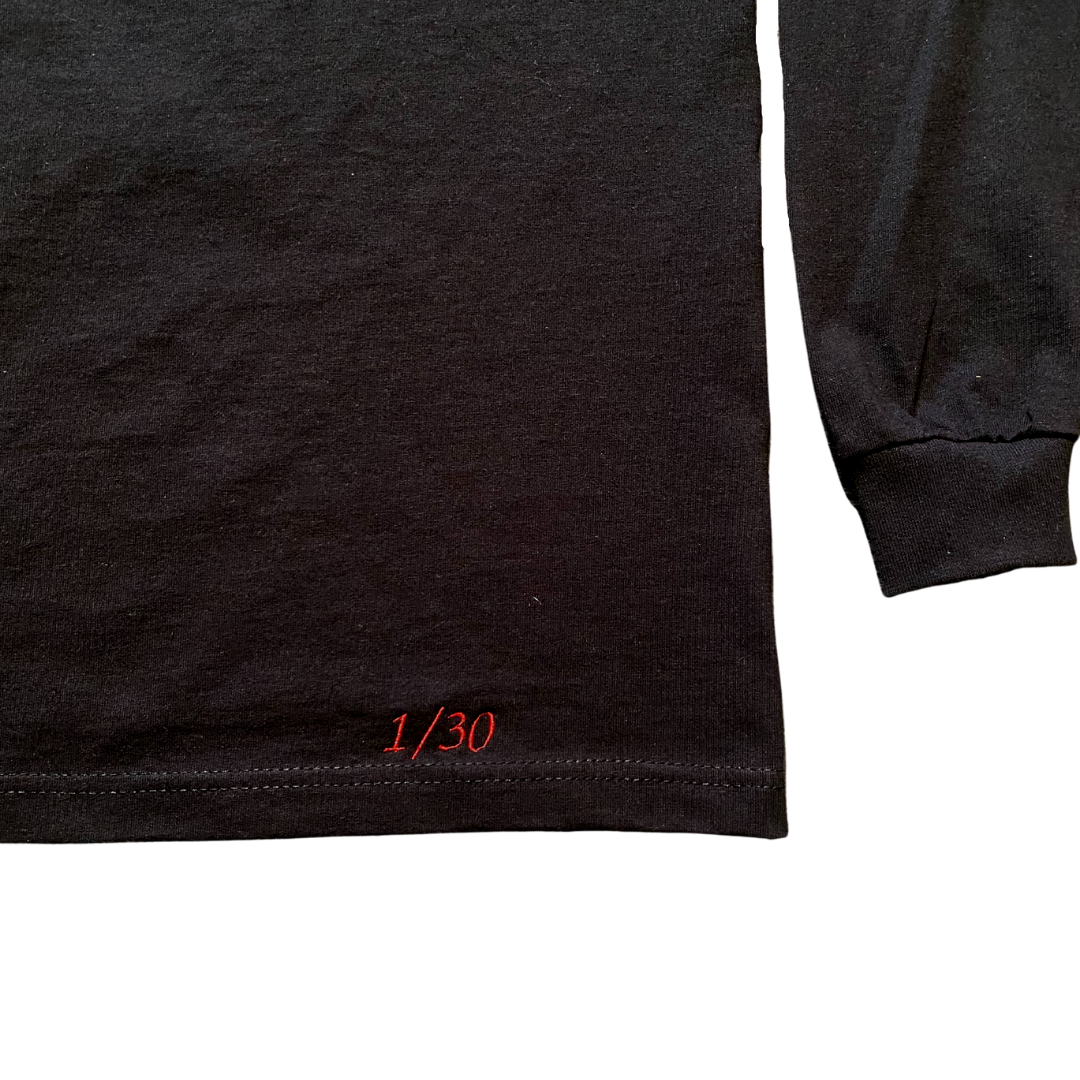 Unapologetic Youth long sleeve shirt titled "Ignite The Flame" featuring bold flame graphic on a black fabric.