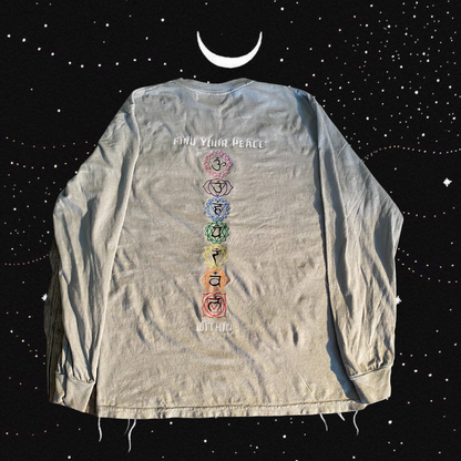 Unapologetic Youth Inner Awakening long sleeve shirt with bold graphic design on black fabric.