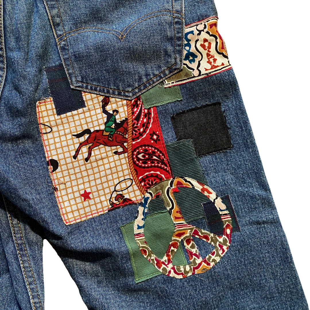 Unapologetic Youth Peaceful Cowboy 32x32 jeans showing classic denim with a relaxed fit and detailed stitching.
