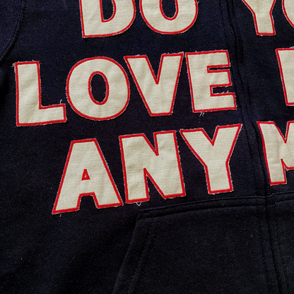 Unapologetic Youth Always & Forever large zip-up hoodie in black, featuring a front zipper and casual style.