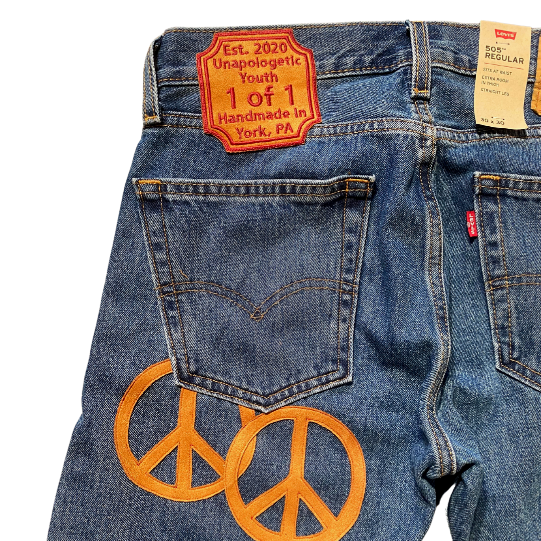 Unapologetic Youth Groovy 30x30 jeans, showcasing classic denim fit and style with visible stitching and pocket details.