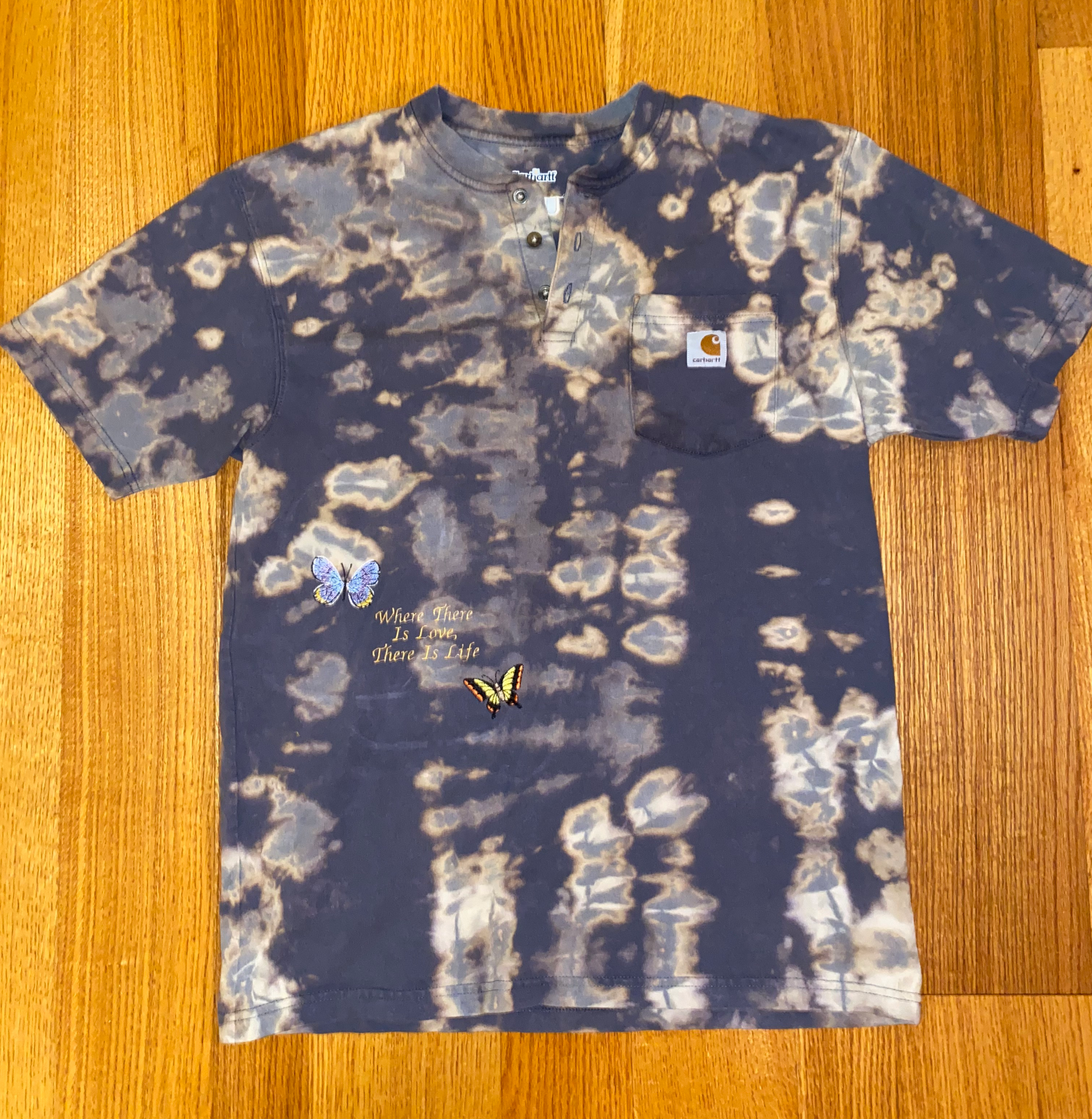 Unapologetic Youth x Carhartt "Where There Is Love" T-shirt with graphic print on white fabric.