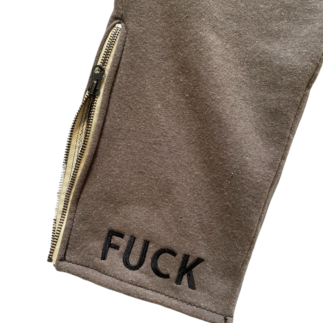 Unapologetic Youth F*cked medium sweatpants with bold text design, casual fit, and comfortable fabric for everyday wear.
