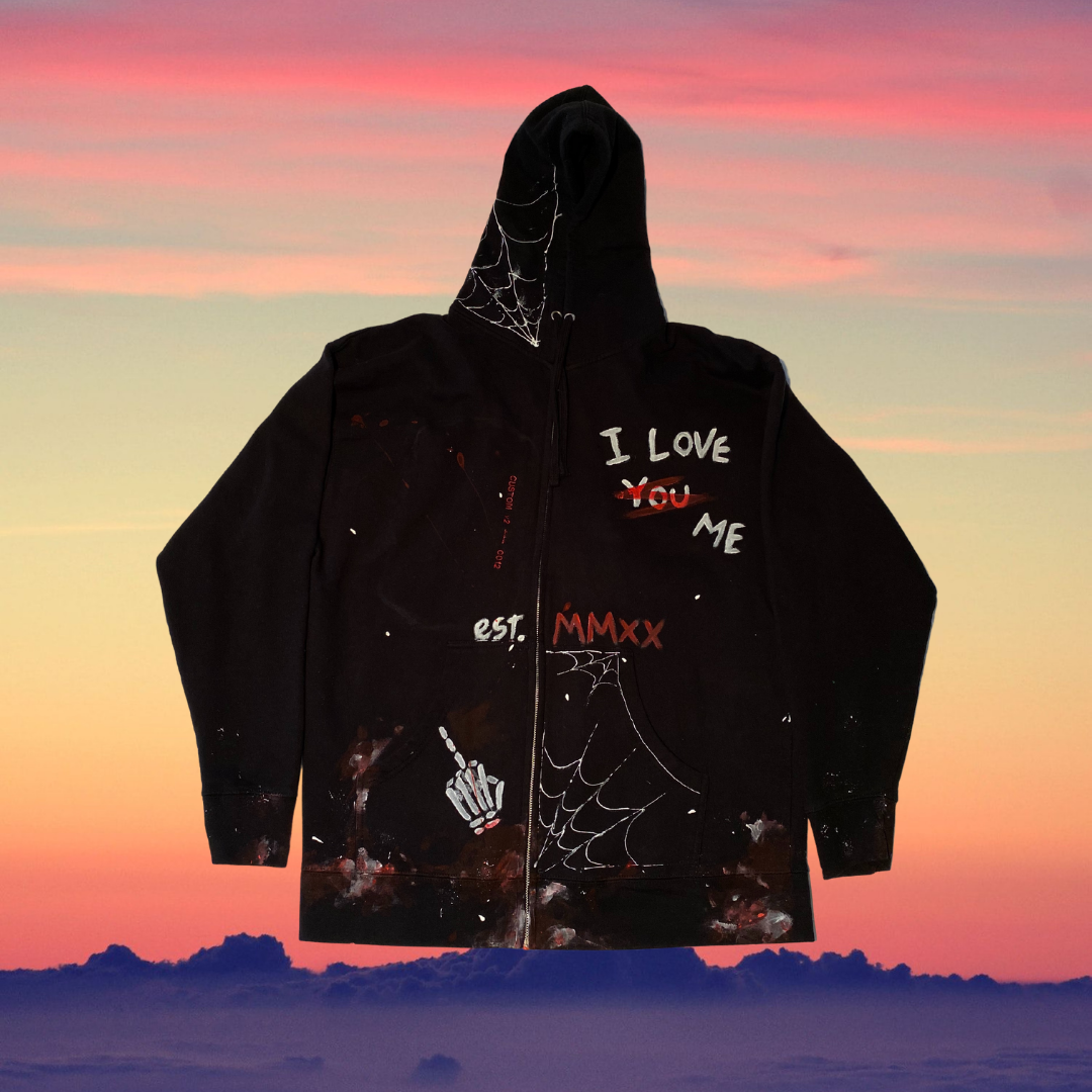 Black Unapologetic Youth hoodie with front pocket and drawstring hood, casual streetwear style.