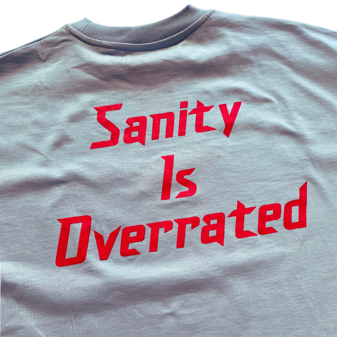 Unapologetic Youth Sanity T-shirt with graphic design, casual fit, white fabric, and short sleeves.