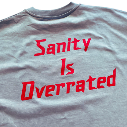 Unapologetic Youth Sanity T-shirt with graphic design, casual fit, white fabric, and short sleeves.