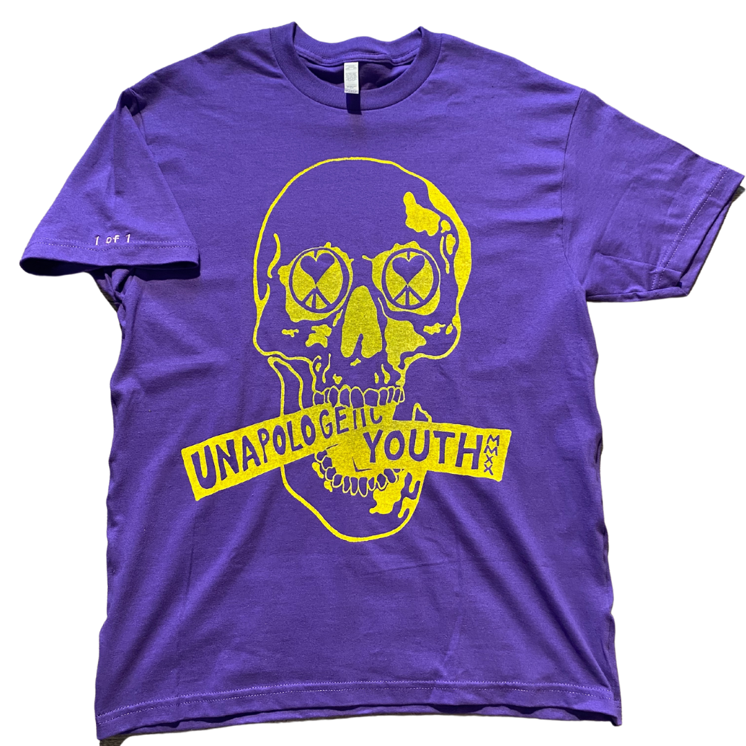 Unapologetic Youth purple T-shirt with a casual fit, displayed flat with visible neckline and sleeve details.