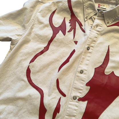 Unapologetic Youth button-down shirt featuring a minimalist nudity print, displayed on a hanger against a plain background.