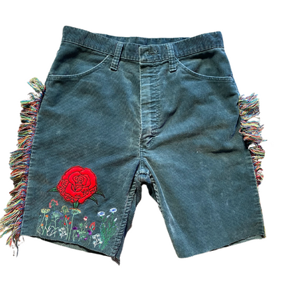 Unapologetic Youth Rose Meadow shorts displayed on a model, showcasing the floral patterned casual summer shorts.