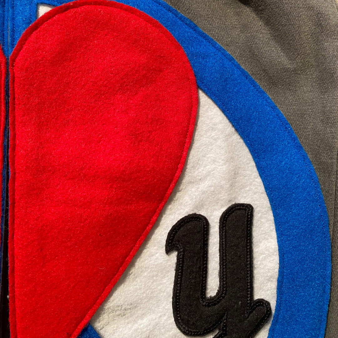 Unapologetic Youth Split Logo sweatpants with stylish side panel design and comfortable fit, perfect for casual wear.
