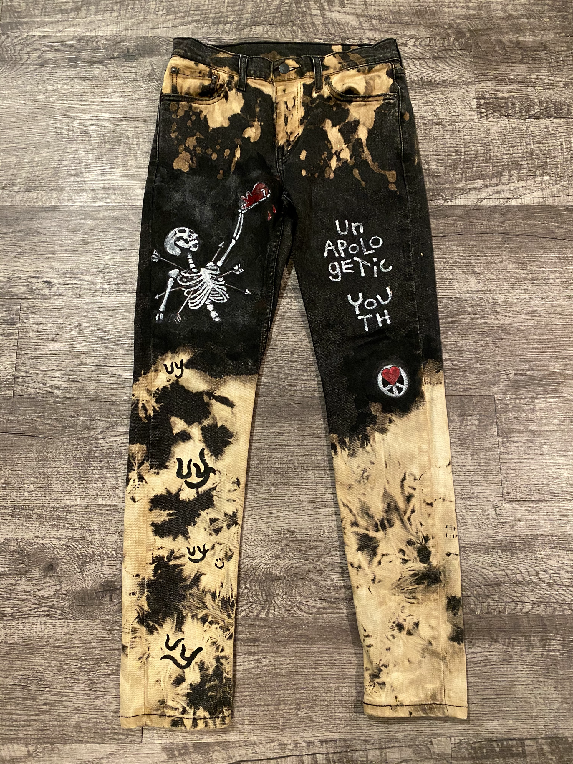 Unapologetic Youth Never Ending jeans featuring classic denim style and detailed stitching on a model.
