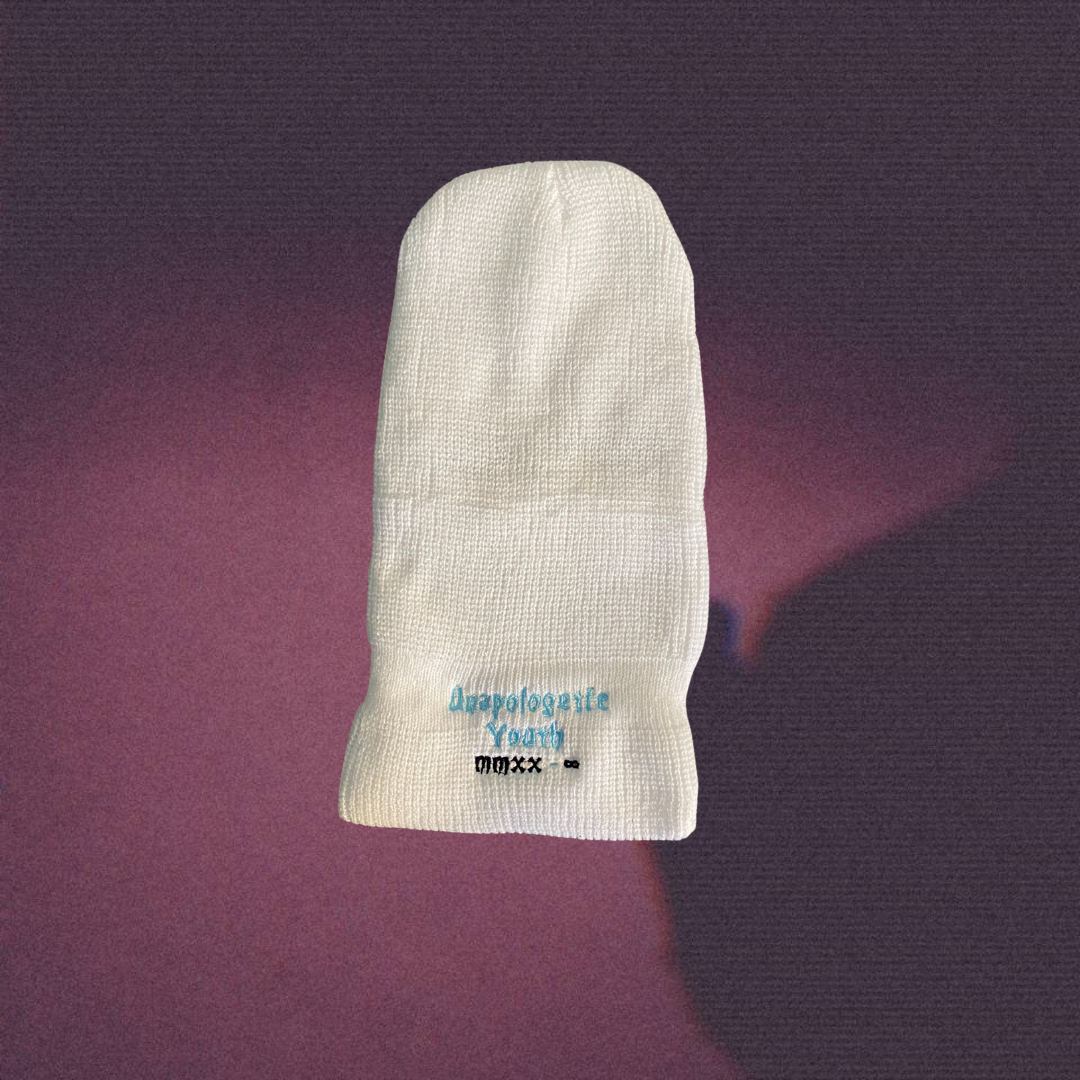Unapologetic Youth Lick Hitter ski mask, black nylon ski mask with eye and mouth openings, cozy winter face covering for cold weather.
