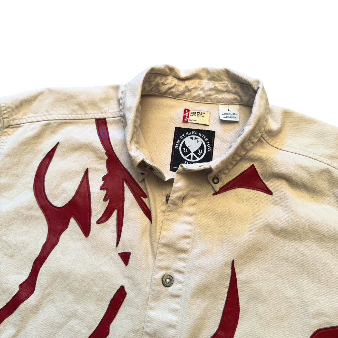 Unapologetic Youth button-down shirt featuring a nudity-themed graphic, casual fit, and long sleeves, displayed on a mannequin.