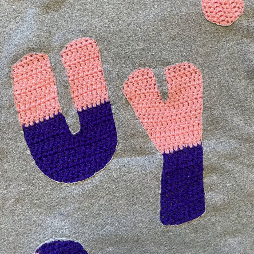 Unapologetic Youth Grandma’s Crochet hoodie featuring a cozy knit design in soft colors, casual fit, and hooded style.