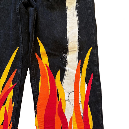 Unapologetic Youth Bones jeans featuring distressed denim, slim fit, with front and back pockets, in a casual streetwear style
