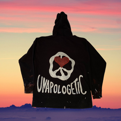 Unapologetic Youth hoodie in black with graphic design, featuring a comfortable fit and casual style for everyday wear.