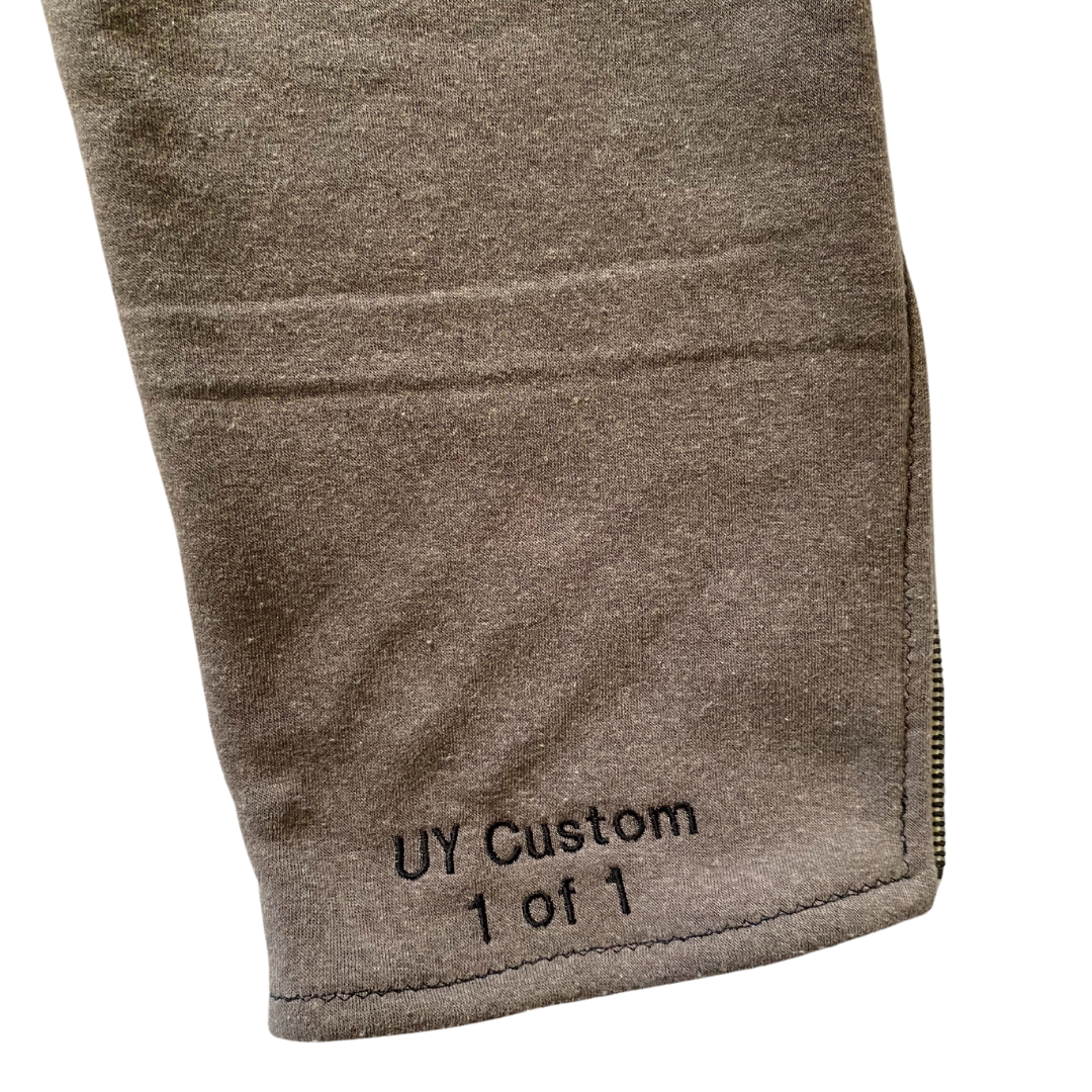 Unapologetic Youth F*cked medium sweatpants with relaxed fit and drawstring waist, made from soft fabric.