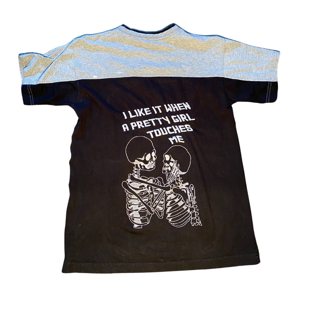 Unapologetic Youth black T-shirt with bold graphic design, casual fit, and short sleeves, ideal for everyday wear.
