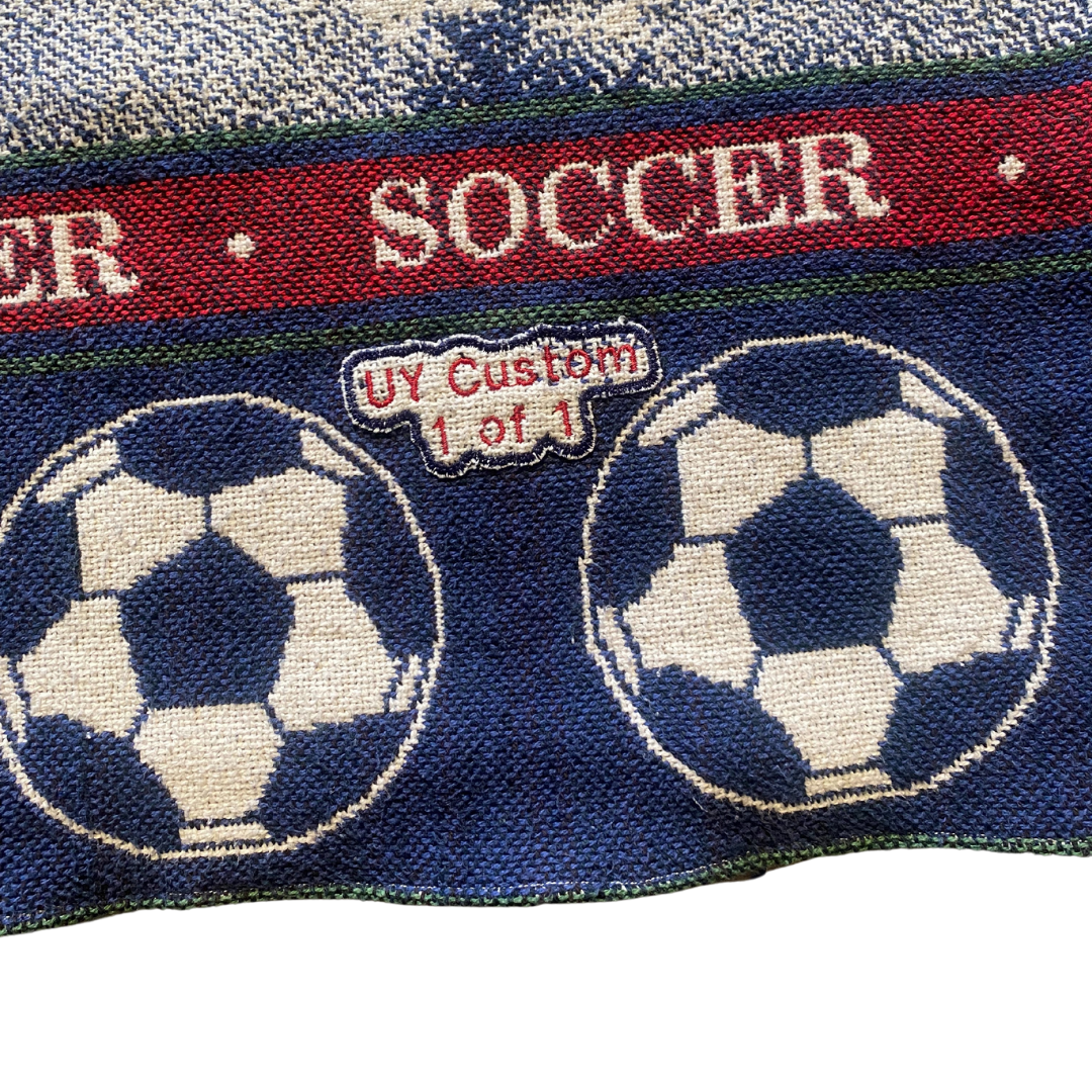 Unapologetic Youth XL futbol T-shirt featuring bold football-themed graphics on soft fabric, ideal for sports fans and casual wear.