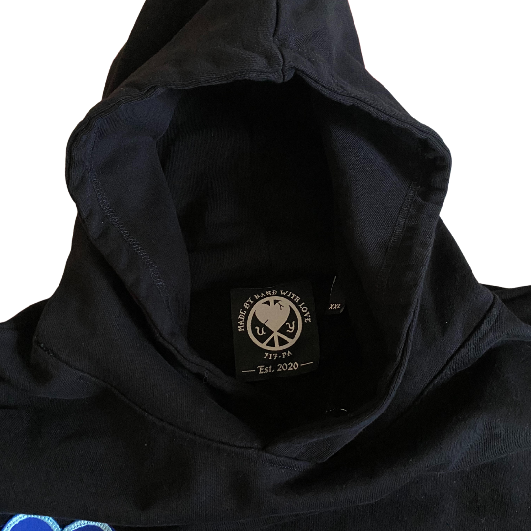 Unapologetic Youth Hippie Dreams hoodie with colorful bohemian design, soft fabric, and relaxed fit for casual, comfortable style.