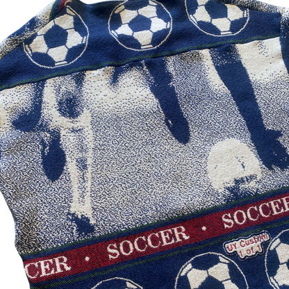 Unapologetic Youth XL football T-shirt featuring bold soccer-themed design on white fabric.