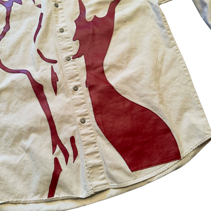 Unapologetic Youth button-down shirt featuring a nudity-themed design, shown on a model in a casual setting.