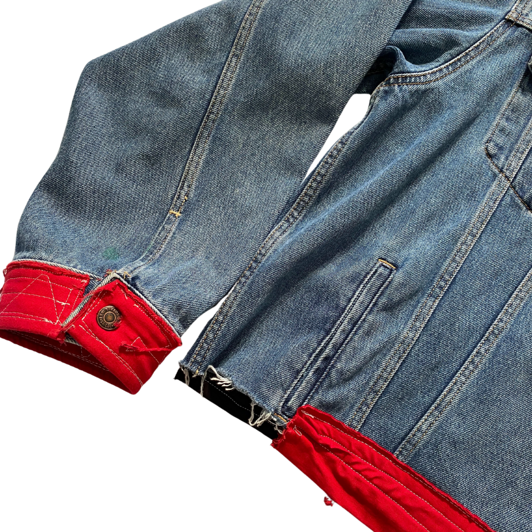 Unapologetic Youth Torn Large/XL denim jacket with distressed details and classic fit, shown on a hanger.