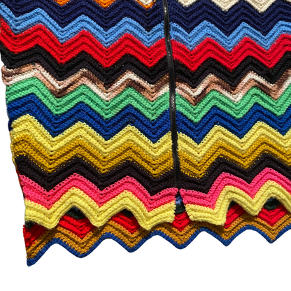 Unapologetic Youth Grandma's Crochet 4/4 T-shirt featuring a colorful crochet pattern design on the front.