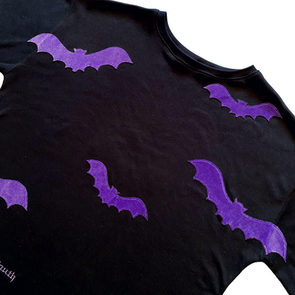 Unapologetic Youth Spooky V2 T-Shirt featuring a spooky graphic design on black cotton fabric.