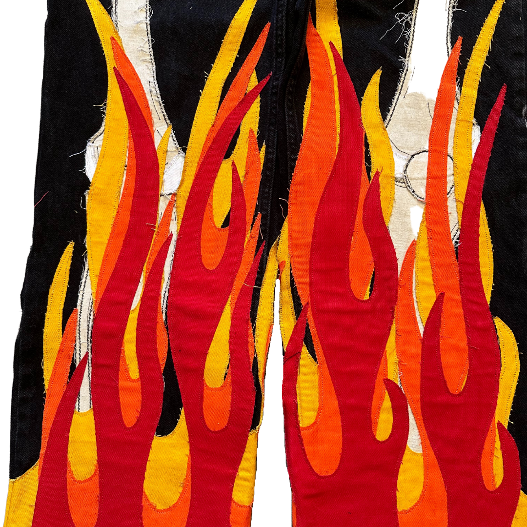 Unapologetic Youth Bones jeans display a stylish pair of denim pants with a distressed, edgy design and classic five-pocket style.