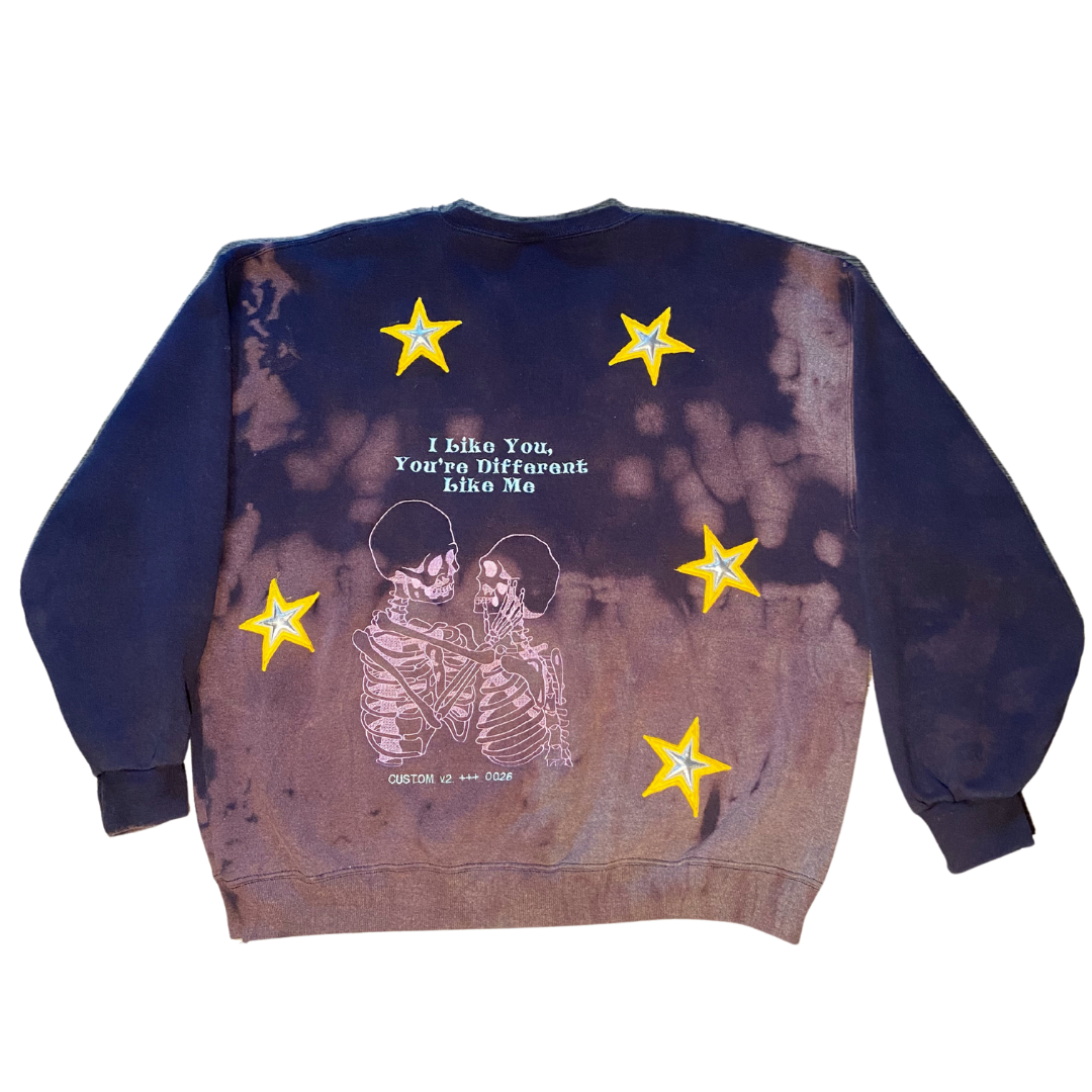 Unapologetic Youth crewneck sweatshirt with a relaxed fit, featuring a simple design and soft fabric, shown in the product image.