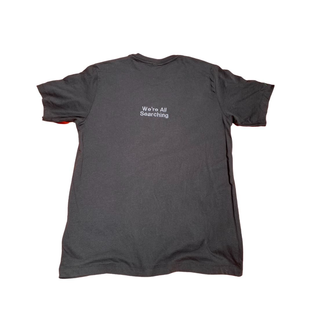 Black Unapologetic Youth Slimey T-Shirt featuring a colorful slime graphic on the front.
