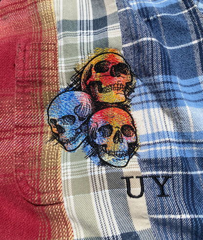 Unapologetic Youth Mix N' Match flannel shirt displayed flat, showcasing its stylish plaid pattern and soft fabric texture.