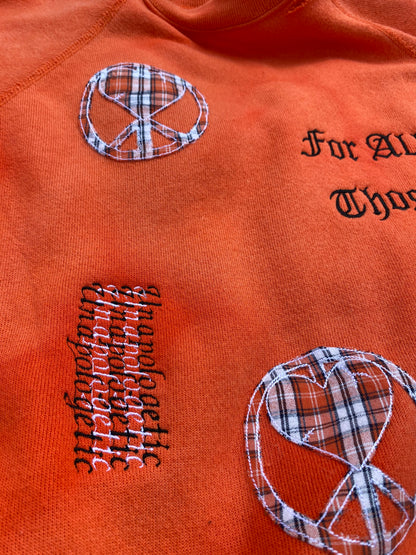 Unapologetic Youth love crewneck sweatshirt with a soft fabric, featuring a minimalist heart design on the front.