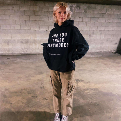 Unapologetic Youth "Are You There?" hoodie in black, featuring bold white text on the front, casual fit, and soft fabric.