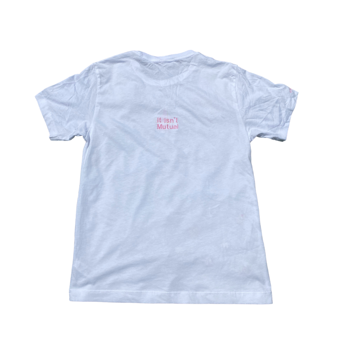 Black Unapologetic Youth Odd Ball T-shirt featuring a colorful graphic design on the back.