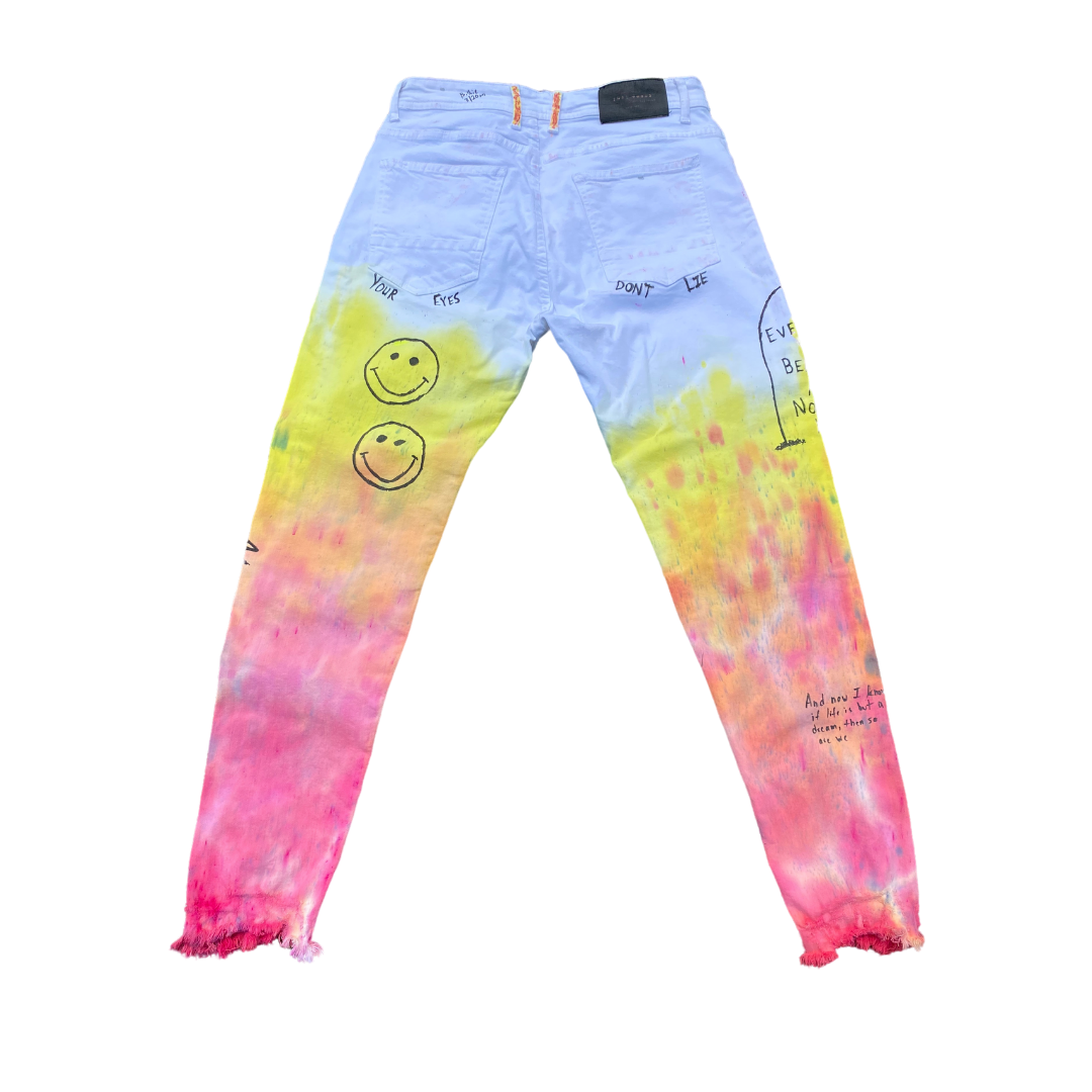 Unapologetic Youth Peace In Chaos jeans featuring distressed denim with a relaxed fit and unique patchwork design.