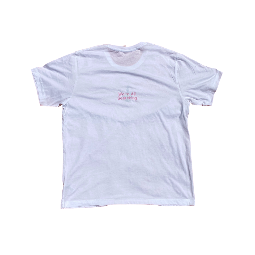 Back view of Unapologetic Youth pink T-shirt featuring a Pink Panther graphic on the back.