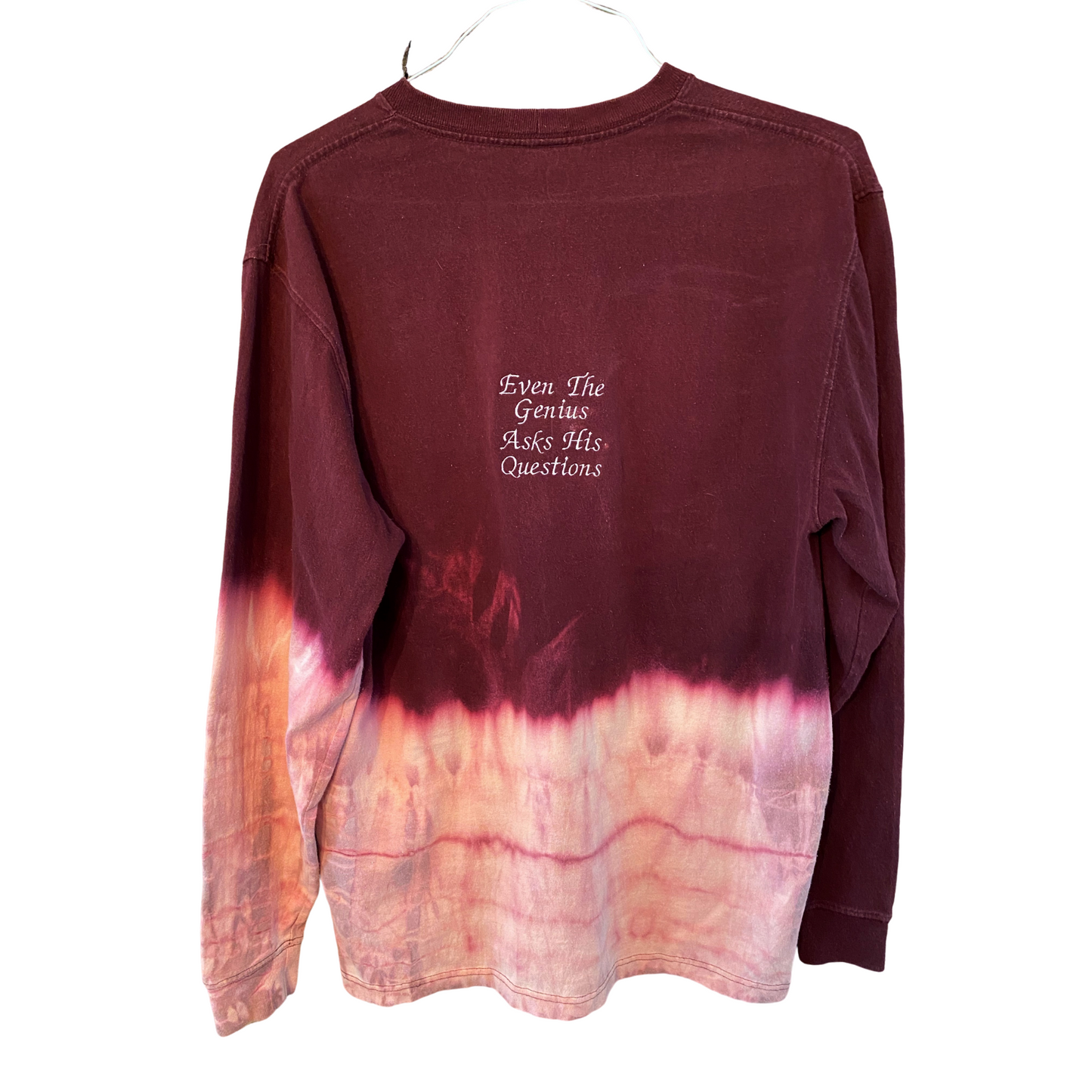 Unapologetic Youth x Carhartt Evil Genius long sleeve shirt with graphic design on front, black fabric, and comfortable fit.