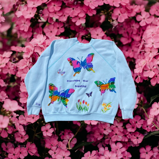 Unapologetic Youth Flower Child crewneck sweatshirt with floral design on soft fabric, casual and stylish for everyday wear.